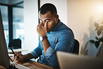 Image showing Burnout, headache and man in the office while working on a deadline project with eye strain at night. Stress, migraine and professional male employee doing research on computer in workplace overtime.