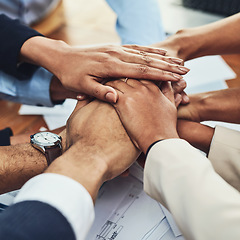 Image showing Closeup of hands together, business people in meeting and solidarity, support and team huddle with collaboration. Group of employees working, teamwork and mission with hand stack over paperwork