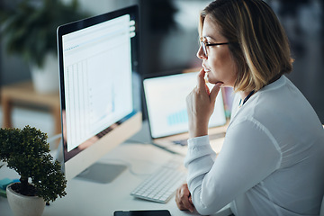 Image showing Business, night and woman with focus, computer and check details for a new project, feedback and review. Female person, employee or consultant with a pc, evening or technology for planning with ideas