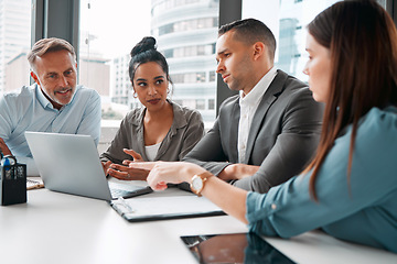 Image showing Laptop, business meeting and team discussion for presentation analysis, training and sales marketing in modern office. Teamwork, corporate conversation and planning web strategy with tech device