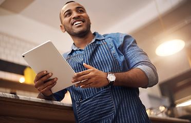 Image showing Coffee shop, tablet and smile with man in cafe for online, entrepreneurship and startup. African, technology and food industry with small business owner in restaurant for barista, network and waiter