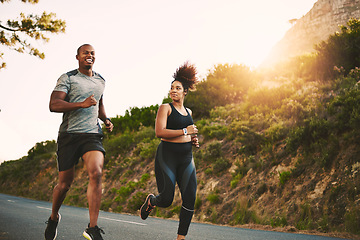 Image showing Sports, health and couple running by mountain training for race, marathon or competition. Fitness, nature and African runners doing outdoor cardio workout or exercise on road trail together at sunset