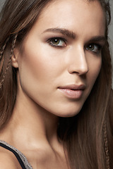 Image showing Woman, closeup and face in natural beauty with makeup for skincare, contour or foundation against a grey studio background. Portrait of female person or model looking with cosmetic facial treatment