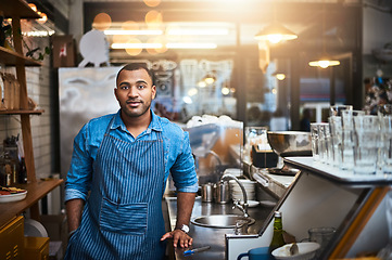 Image showing Coffee shop, barista and portrait of man in restaurant for service, working and standing by cafe counter. Small business owner, bistro startup and serious male waiter in cafeteria ready to serve