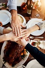 Image showing Food, joining hands and people together at table to celebrate holiday, Christmas or thanksgiving. Above family or friends group with hand stack for gratitude, chicken or turkey for lunch or dinner