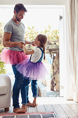 Image showing Daughter on father feet, ballet dancing and fun with learning at home in tutu, bond with love and creativity. Family, man and girl dance in living room, ballerina lesson and spending time together