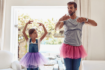 Image showing Father with daughter, ballet dancing and teaching with learning at home in tutu, bond with love and creativity. Family, man and girl dance in living room, ballerina lesson and spending time together