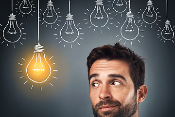 Image showing Lightbulb, man or thinking of ideas, vision or goals of innovation in studio on grey background. Businessman, graphic or thoughtful person with insight on entrepreneurship problem solving or solution