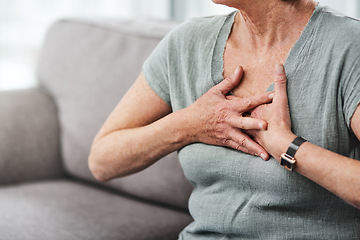 Image showing Heart attack, chest pain and sick senior woman with asthma in her home living room or couch with an emergency. Crisis, medical and elderly person with discomfort due to illness or breathing problem