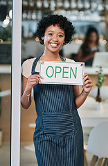 Image showing Happy woman, open sign and portrait of small business owner or waitress at cafe for morning or ready to serve. African female person at restaurant holding board for coffee shop or cafeteria opening