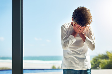 Image showing Sad, depression and crying child with hands covering face while lonely and unhappy. Depressed, psychology and scared boy kid with anxiety problem, grief or upset in isolation in a house