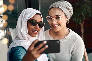 Image showing Selfie, muslim women and friends smile in city for social media, influencer content creation or fashion blog. Young gen z people in Saudi Arabia for profile picture, online photography and sunglasses