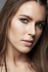 Image showing Face, beauty and portrait of beautiful woman in studio for wellness, facial treatment and skincare. Salon, closeup and female person with natural cosmetics, makeup and skin glow on gray background