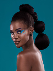 Image showing Portrait, beauty and makeup with a model black woman in studio on a blue background for hair or fashion. Face, cosmetics and haircare with an attractive young female person posing for haircare