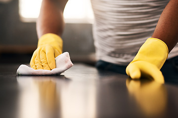 Image showing Man hands, cleaning gloves and wipe on a table with a wash cloth and housekeeping. Home, countertop and male person with disinfectant and scrub with washing in a apartment with maid and housekeeper