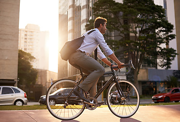 Image showing Morning, bicycle and business man in city for moving, commute and carbon neutral transportation. Travel, sustainability and cycling with male employee in urban town for journey, energy and transit