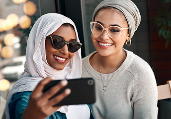 Image showing Selfie, happy muslim and women or friends in city for social media, influencer content creation and fashion blog. Young gen z people in Saudi Arabia with profile picture, photography and sunglasses