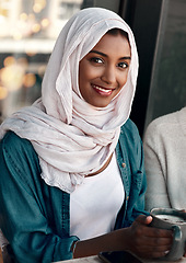 Image showing Muslim woman, coffee shop and portrait for happy customer, morning relax and restaurant. Face of young islamic person in hijab with tea, latte or drink at cafe for hospitality industry