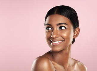 Image showing Thinking, skincare and face smile of woman in studio isolated on a pink background mockup. Natural beauty, happy and Indian female model with makeup, cosmetics or spa facial treatment for skin health