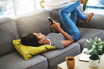 Image showing Relax, phone and woman on sofa in home for network, online website and social media. Communication, mobile app and happy female person on smartphone for chatting, text message and internet connection