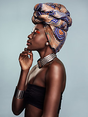 Image showing Fashion, head scarf and profile of black woman in studio on gray background with glamour, cosmetics and makeup. Luxury, culture and face of female person in exotic jewelry, African style and beauty