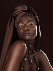 Image showing Portrait, fashion and black woman with makeup, tradition and stylish girl against a dark studio background. Face, female person and model with trendy outfit, glamour and wellness with confidence