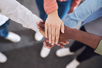 Image showing Top view, hands together and team building, trust with diversity and collaboration in creative group at startup. Teamwork, solidarity and support, hand stack for goal and people in community