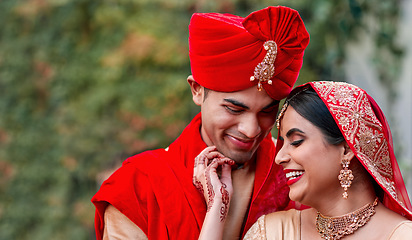 Image showing Wedding, marriage and indian couple together in celebration of love or commitment at a ceremony. Happy, romantic or hindu with a bride and groom getting married outdoor in tradition of their culture