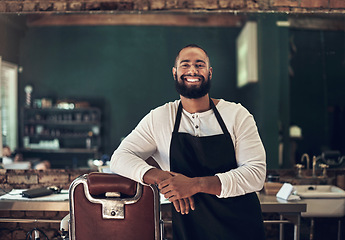 Image showing Barber shop, hair stylist and black man portrait of an entrepreneur with a smile. Salon, professional worker and male person face with happiness and proud from small business and beauty parlor