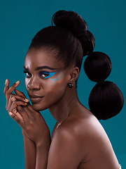 Image showing Portrait, beauty and cosmetics with a model black woman in studio on a blue background for hair or fashion. Face, makeup and haircare with an attractive young female person posing for haircare