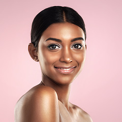 Image showing Face, skincare and smile of woman in studio isolated on a pink background mockup. Portrait, natural beauty and Indian female model with makeup, cosmetics and spa facial treatment for healthy skin.