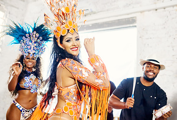 Image showing Samba, music and dance with women at carnival for celebration, party and festival in Rio de Janeiro. New year break, show and creative with brazil girl for performance, holiday and new year event