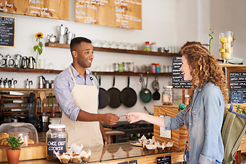 Image showing Credit card, barista man and customer at a coffee shop with a payment and cafe worker. Restaurant, male service employee and female person paying for drink at checkout with waiter and smile in store