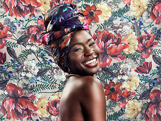 Image showing Fashion, beauty and portrait of black woman on flower background with glamour, cosmetics and makeup. Floral pattern, happy and face of female person in exotic jewelry, African style and head scarf