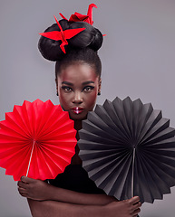 Image showing Portrait, makeup and origami with black woman in studio for creative, art and culture. Traditional, cosmetics and paper design with female model on grey background for asian, beauty and color