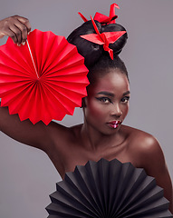 Image showing Creative beauty, portrait and makeup with black woman in studio for art and culture. Fashion, cosmetics and paper design with female model on grey background for asian, origami or color