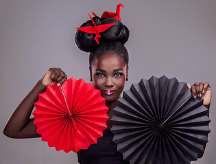 Image showing Culture, makeup and creative with portrait of black woman in studio for origami, art and beauty. Traditional, cosmetics and paper design with model on grey background for asian, retro or color