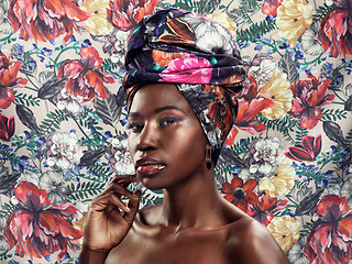 Image showing Portrait, floral and black woman with a head wrap, fashion and confidence with style, trendy and cultural. Face, female person and model with traditional headdress, colorful and beauty with pride