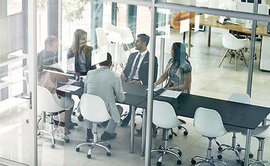 Image showing Business, meeting and people in office for planning, discussion and problem solving. Finance, collaboration and women with men in a boardroom for strategy, integration and a startup deal negotiation