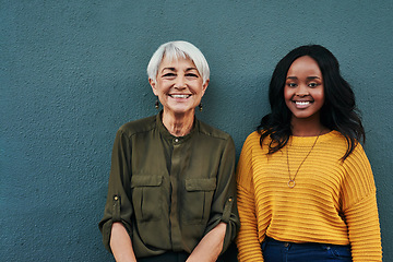 Image showing Happy, diversity and portrait of women on a blue background for success, happiness and work. Smile, business and a young and senior employee standing on a wall for a professional career profile