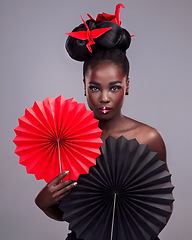 Image showing Beauty, makeup and origami with portrait of black woman in studio for creative, art and culture. Traditional, cosmetics and paper design with model on grey background for asian, retro or color