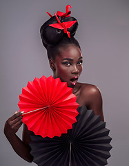 Image showing Shocked, makeup and beauty with portrait of black woman in studio for creative, art and culture. Traditional, cosmetics and paper design with model on grey background for fashion, origami or color