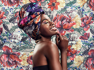 Image showing Flower pattern, head wrap and black woman with a smile, beauty and confident girl against a floral background. Female person, nature and model with a turn, fashion and stylish clothes with tradition