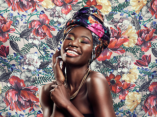 Image showing Head wrap, flowers and black woman with fashion, cheerful and happiness against floral background. Funny, happy model and female person with a turban, stylish and trendy with joy, smile and confident