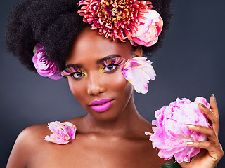 Image showing Makeup, flowers and hair with portrait of black woman for beauty, creative or spring. Natural, cosmetics and floral with face of model isolated on studio background for art, self love or confidence