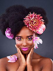 Image showing Makeup, flowers and art with portrait of black woman in studio for beauty, creative or spring. Natural, cosmetics and floral with model isolated on gray background for color, self love or confidence