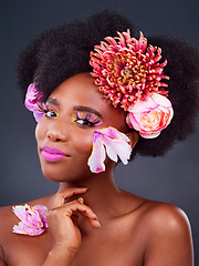 Image showing Makeup, flowers and smile with portrait of black woman for beauty, creative and spring. Natural, cosmetics and floral with face of model isolated on studio background for art, self love or confidence