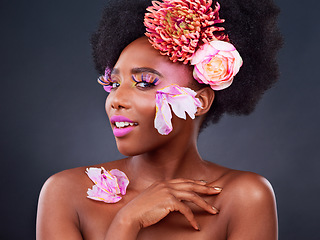 Image showing Makeup, flowers and beauty with portrait of black woman for beauty, creative and spring. Natural, cosmetics and floral with model isolated on studio background for art, self love or confidence