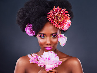 Image showing Makeup, flowers and spring with portrait of black woman for beauty, art and creative. Natural, cosmetics and floral with african model isolated on studio background for color, self love or confidence