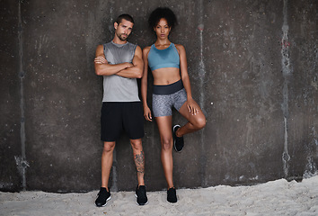 Image showing Fitness, serious and portrait of couple at wall for workout, body builder training and exercise outdoors. Sports, athletes and man and woman after running for endurance, wellness and health